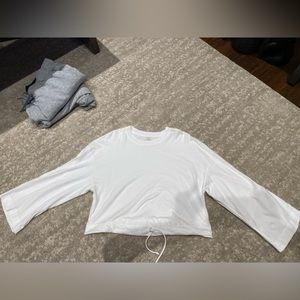 Wilfred Free white bell sleeve shirt, adjustable waist band.